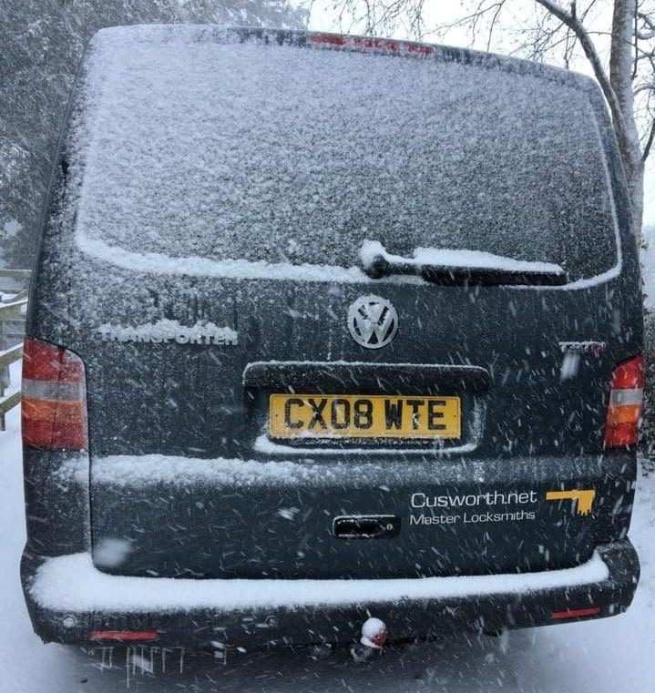 Cusworth Master Locksmith's mobile locksmith van on a snowy day.